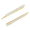 Barrettes dorées perles alignées x 2